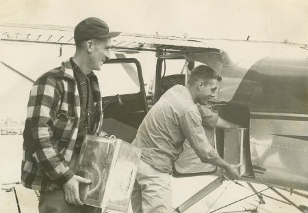 Loading cans of steelhead fry