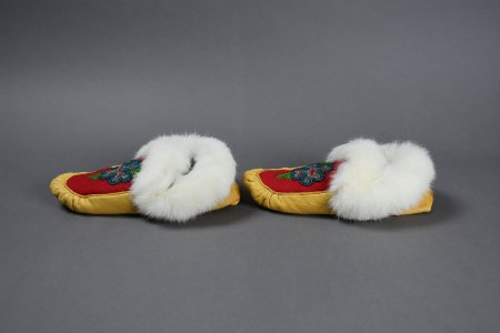 Beaded moccasins with blue flower design profile