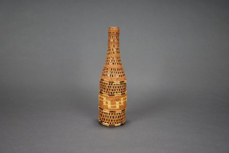 Basketry covered bottle