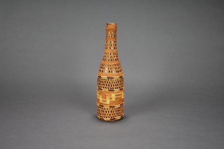 Basketry covered bottle