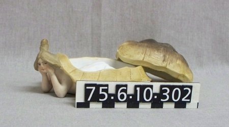 Turtle nymph figurine, side view