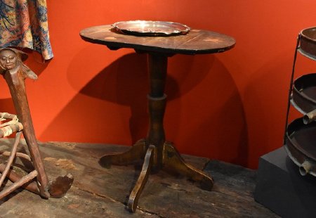 Wood card table on display