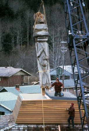 Lowering totem poles at Totem Heritage Center
