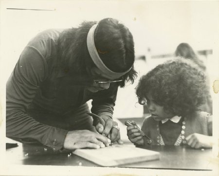 Wayne Price with carving student, 1980