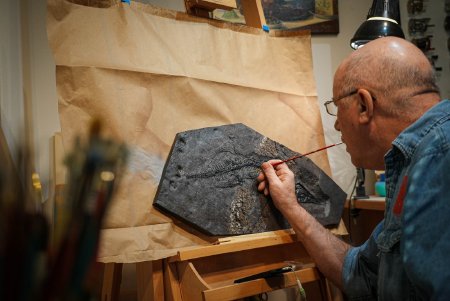 Terry Pyles Painting Fossil Cast, Photography by Patrick Troll