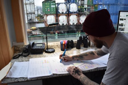 Gabe Love, Checker, Records the Arrival of Containers in Ketchikan, 2024