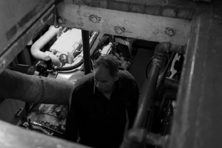 Steven W. Axelson in Engine Room of the <i>F/V Champion</i>