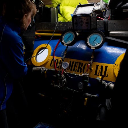 Karen Updike with Hyperbaric Chamber on the <i>D/V Alaskan Salvor</i>