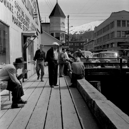 Men gathered on the dock at Tongass Trading