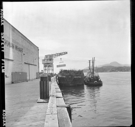 Loading a Foss Lumber Barge