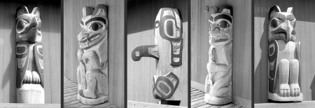 House posts at Totem Heritage Center, (L-R) Raven, Wolf, Killer Whale, Bear