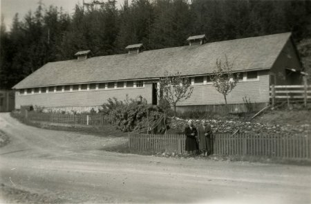 Two women in front of Crystal Dairy barn, 1950. KM 2006.2.34.3.