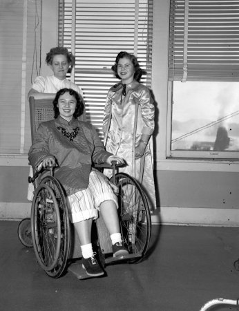 Similar wheelchair in use during the 1953 polio outbreak.