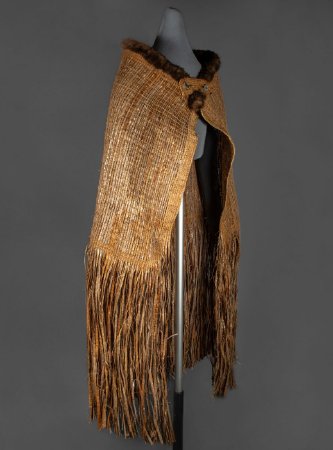 Child's cedar bark robe made by Holly Churchill, 1998.