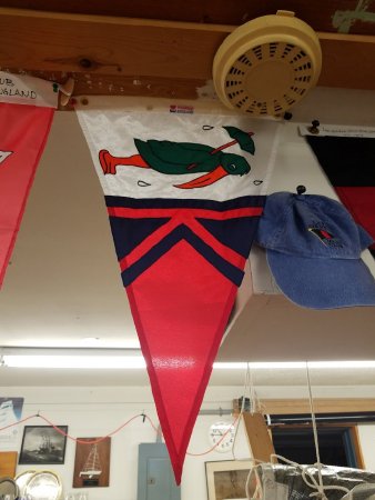 Ketchikan Yacht Club's burgee hanging in Louie Bartos' sail loft