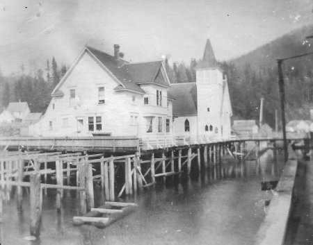 Yates Memorial Hospital and St. John's Church as seen on pilings before Mis